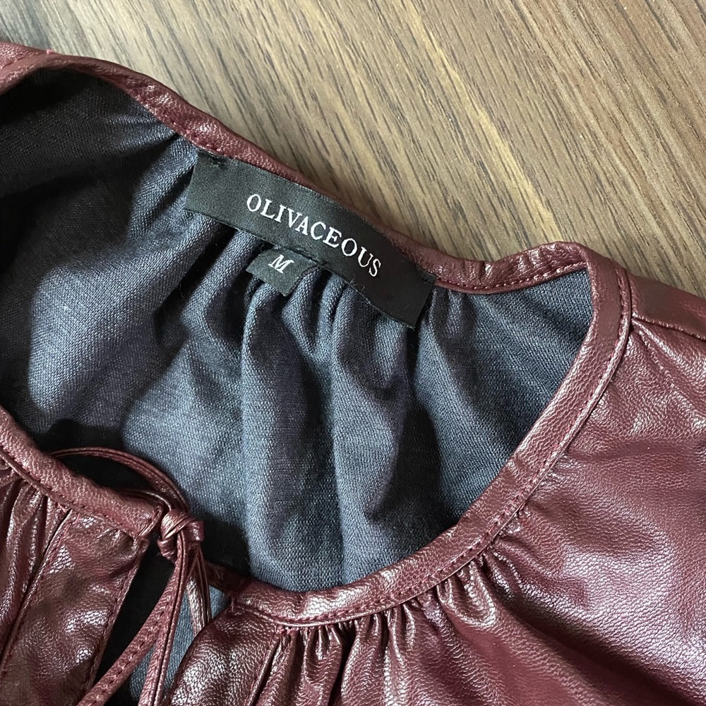 Cute faux leather women top,